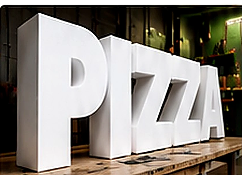 AI concept of white three-dimensional foam business lettering spelling PIZZA